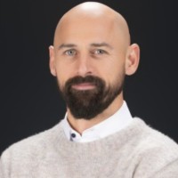 Portrait of a client in a cream sweater